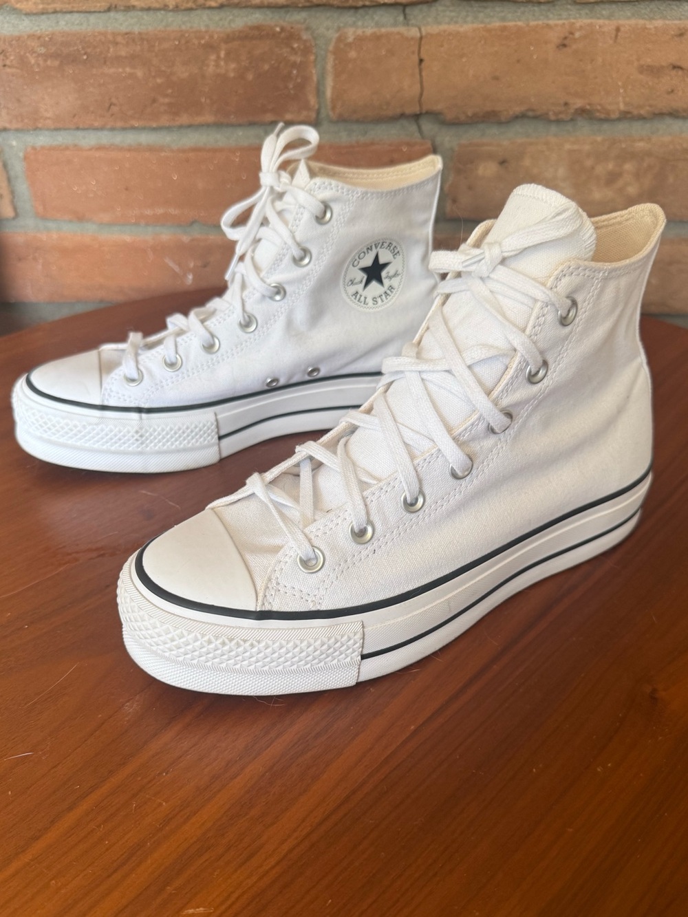 Converse Chuck Taylor All Star Hi Lift canvas platform sneakers in white